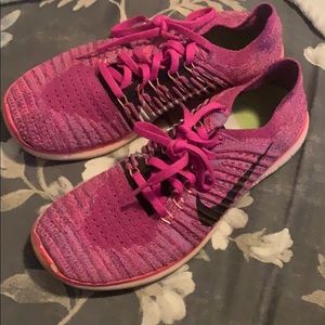 hot pink Nike tennis shoes